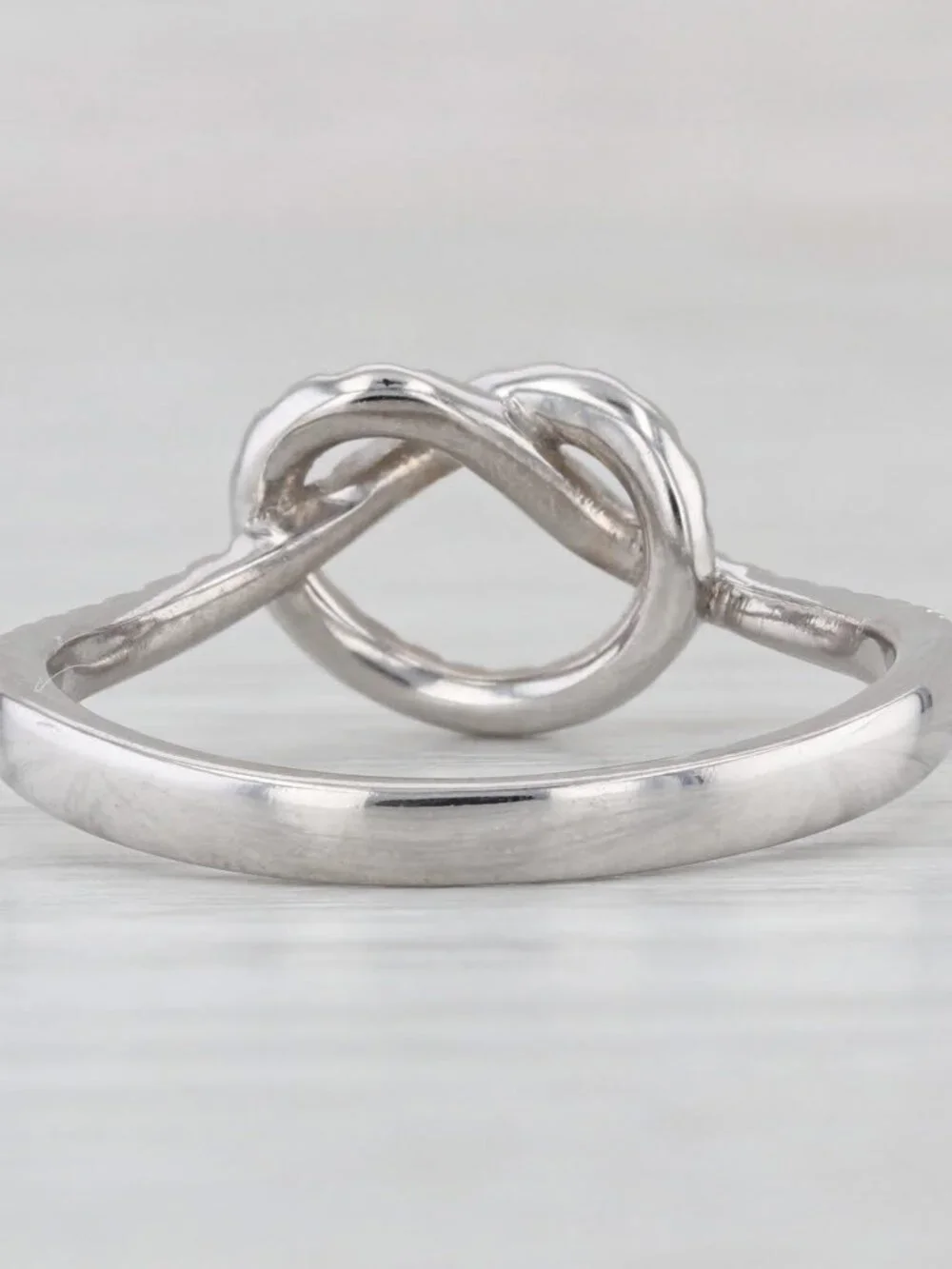 0.25ctw Diamond Preztle Knot Ring 10k White Gold Size 7.5